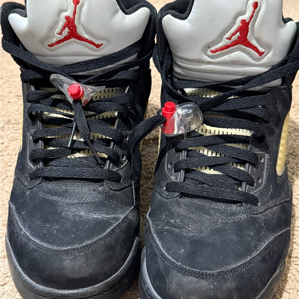 Used Air Jordan Black Sneakers with Red Logo